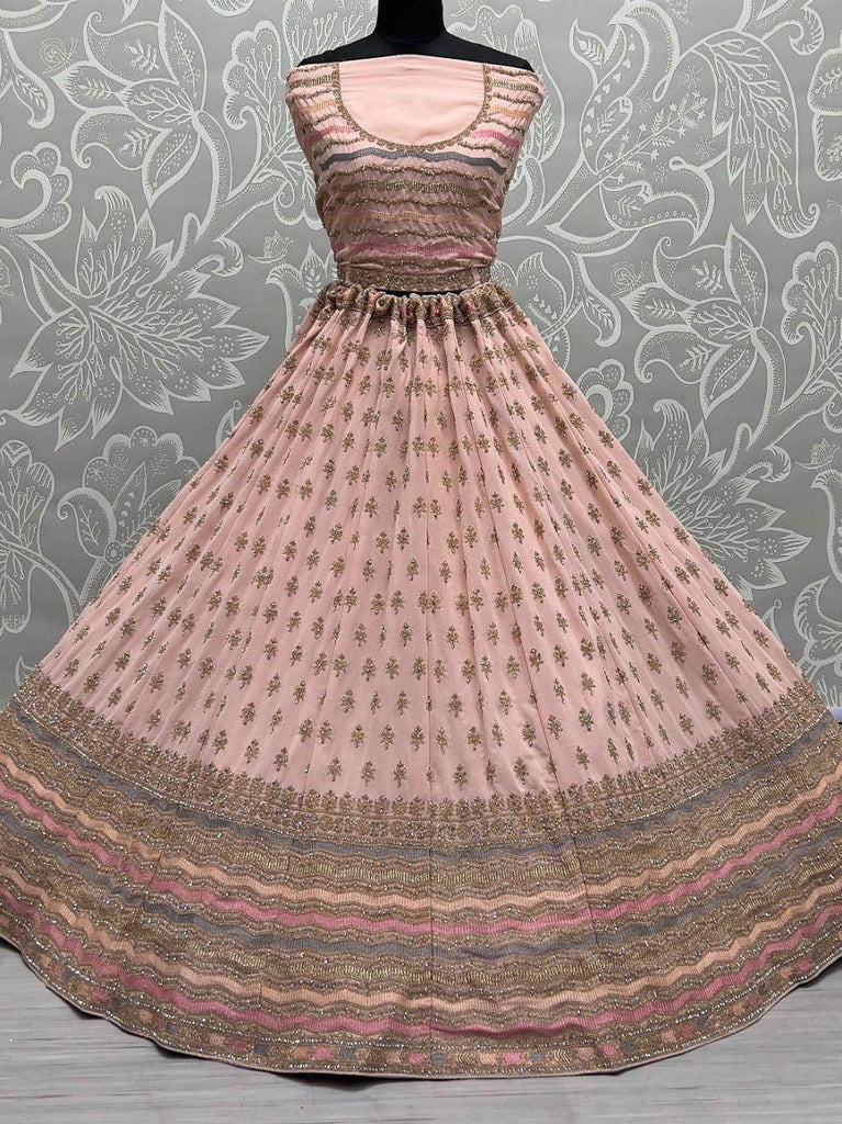 Enchanting Peach Zari Metallic Embroidered Georgette Lehenga Choli
