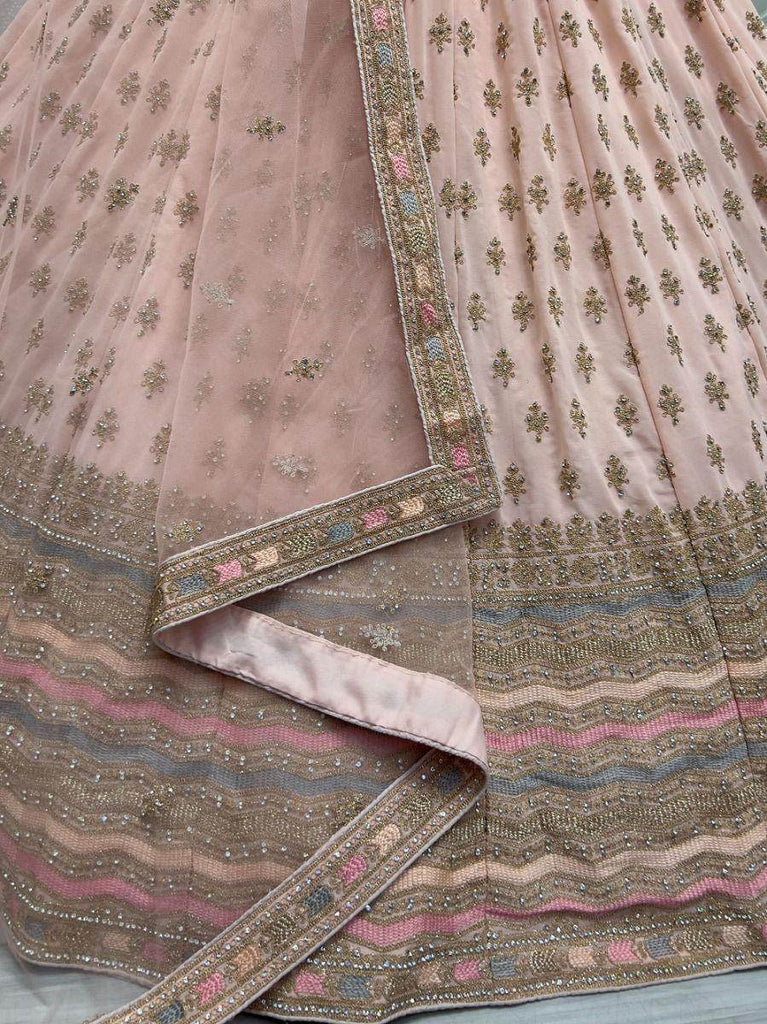 Enchanting Peach Zari Metallic Embroidered Georgette Lehenga Choli
