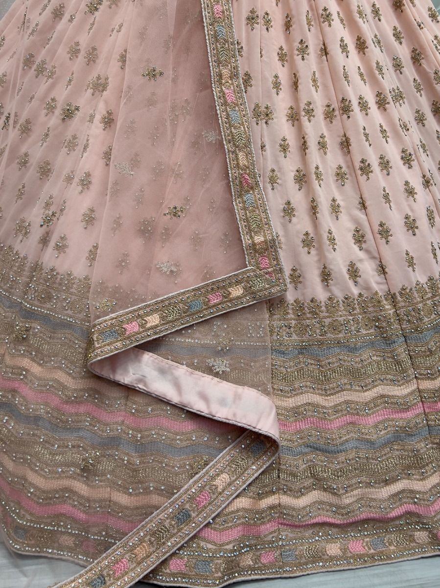 Enchanting Peach Zari Metallic Embroidered Georgette Lehenga Choli