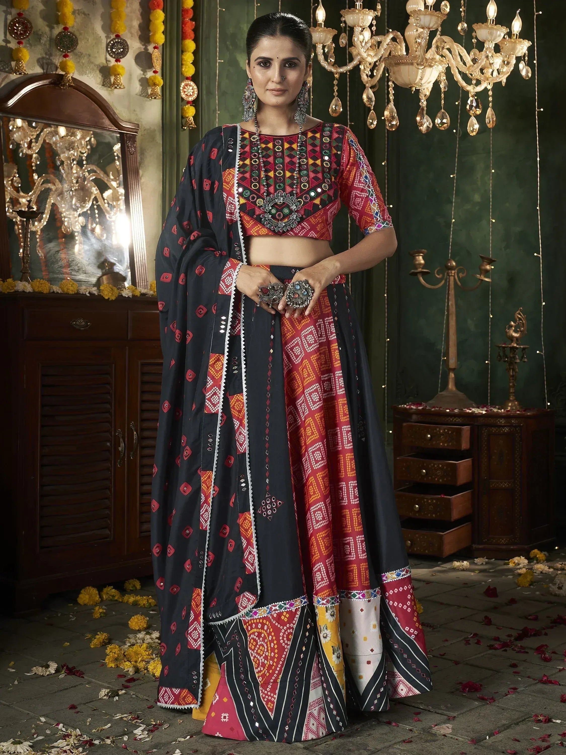 Ethnic Indian lehenga choli with mirror work and geometric patterns, perfect for festive occasions.