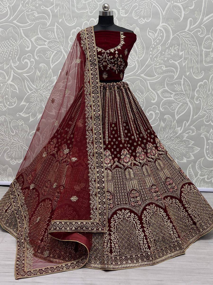 Maroon velvet lehenga choli with gold embroidery, designer Indian ethnic wear for weddings