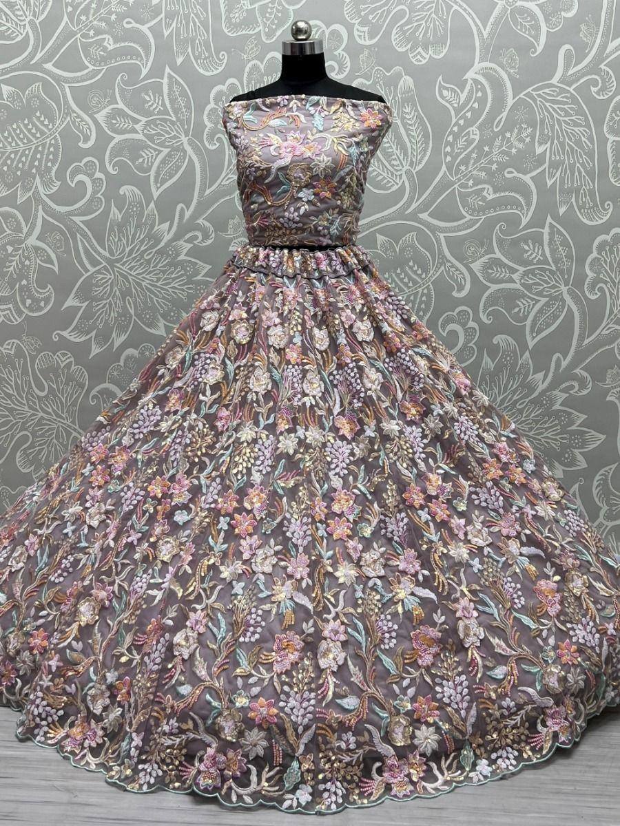 Elegant off-shoulder ethnic gown with floral embroidery, perfect for Indian weddings and festive occasions.