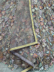 Stunning Beige Multi-Thread Embroidered Net Lehenga Choli