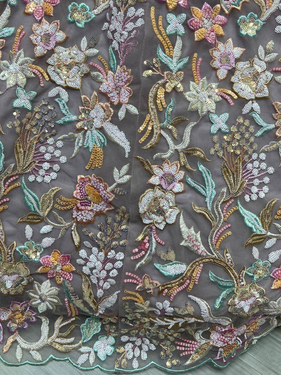 Intricate floral embroidery with sequins on grey fabric, perfect for designer lehenga choli or ethnic gowns