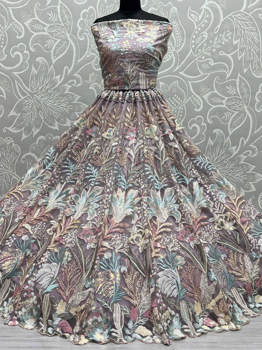 Elegant off-shoulder ethnic gown with floral embroidery, perfect for Indian weddings and festive occasions.