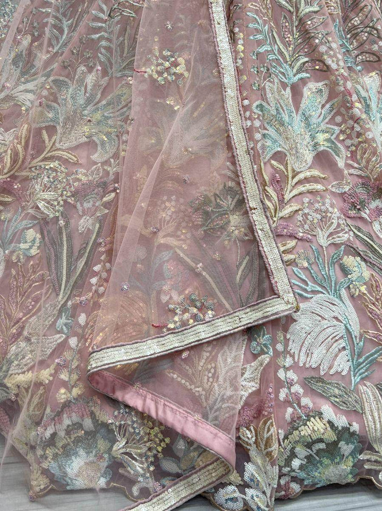 Unexpected Peach Multi-Thread Embroidered Net Lehenga Choli