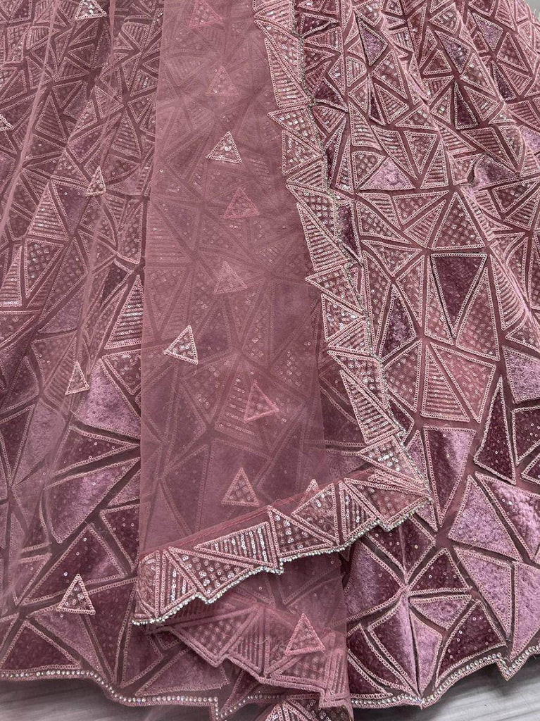 Mesmerizing Peach Sequins Embroidered Net Lehenga Choli