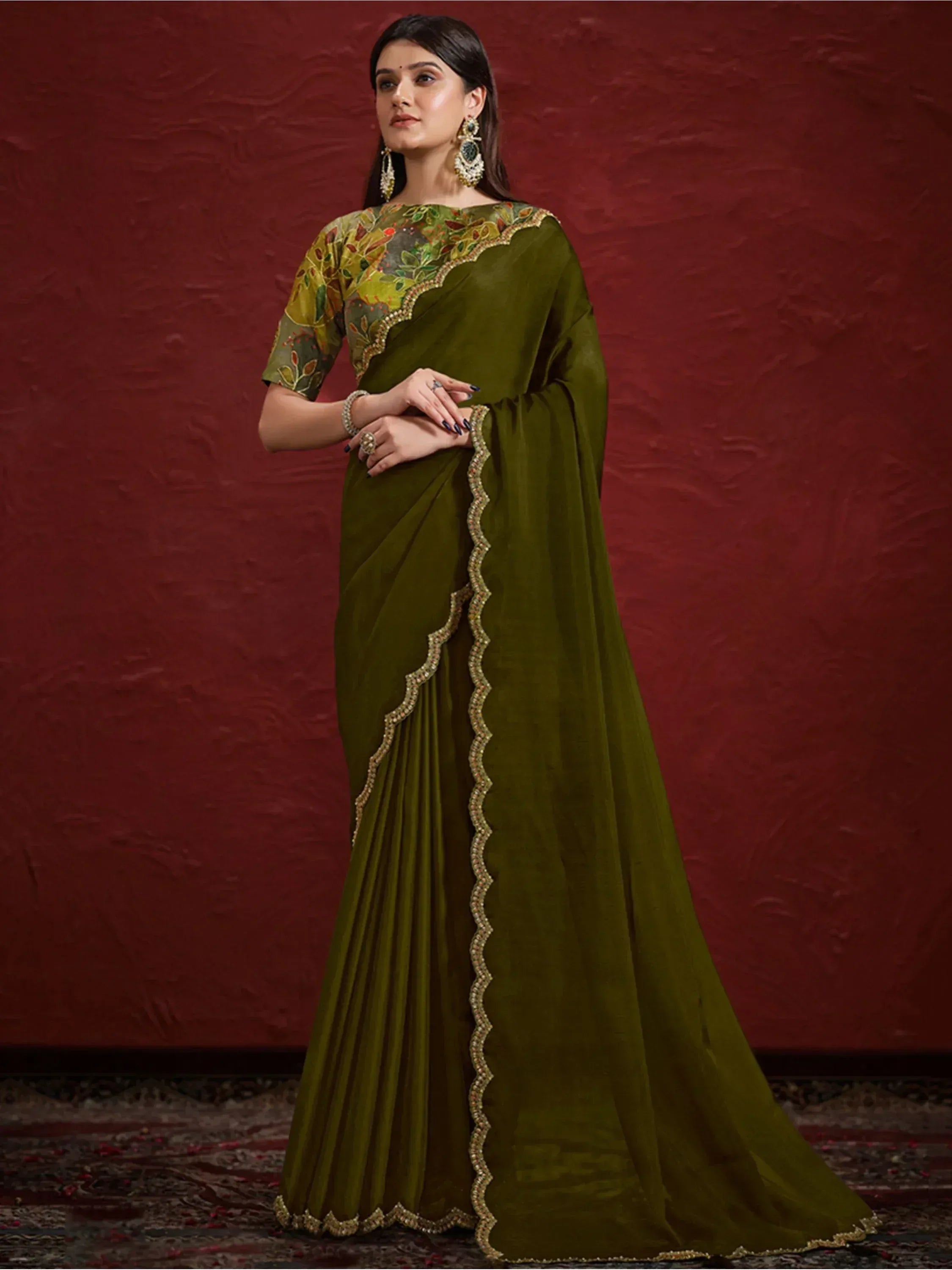 Olive green designer saree with floral embroidered blouse and scalloped border, perfect for Indian ethnic occasions.