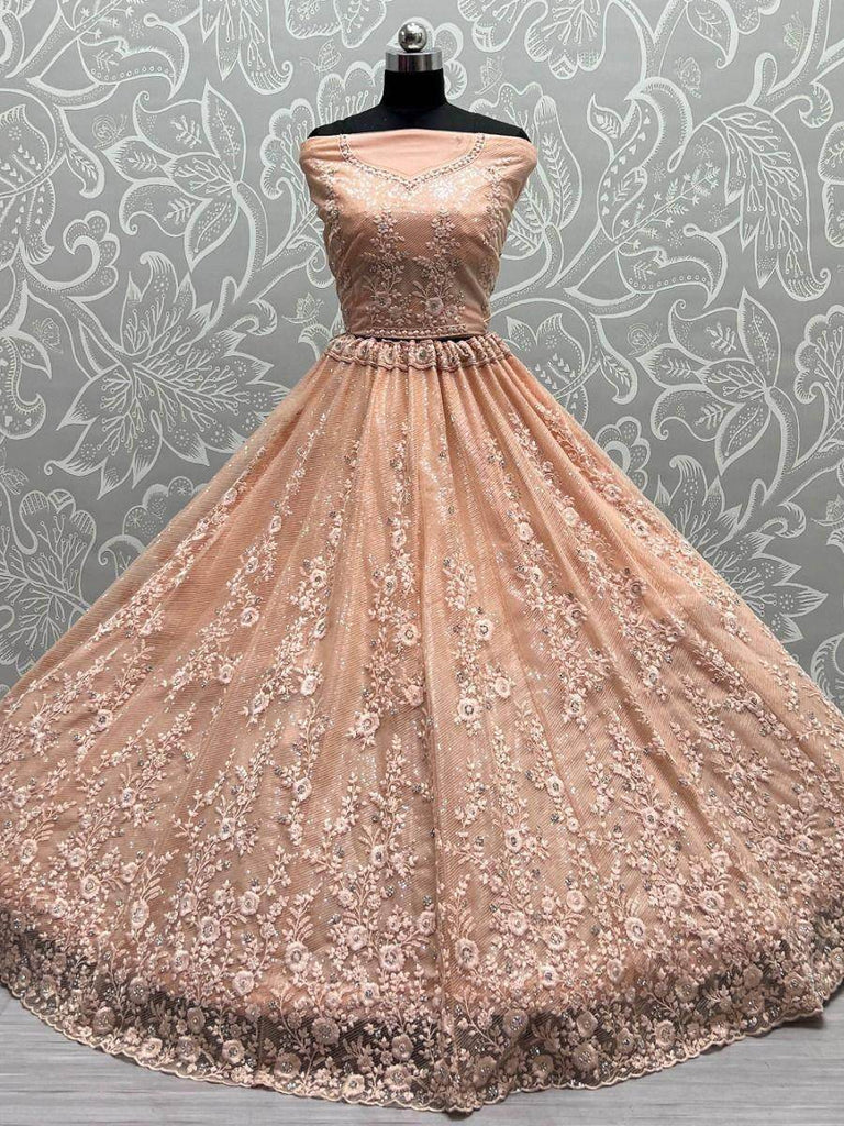 Astonishing Peach Zircon Diamond Work Net Lehenga Choli
