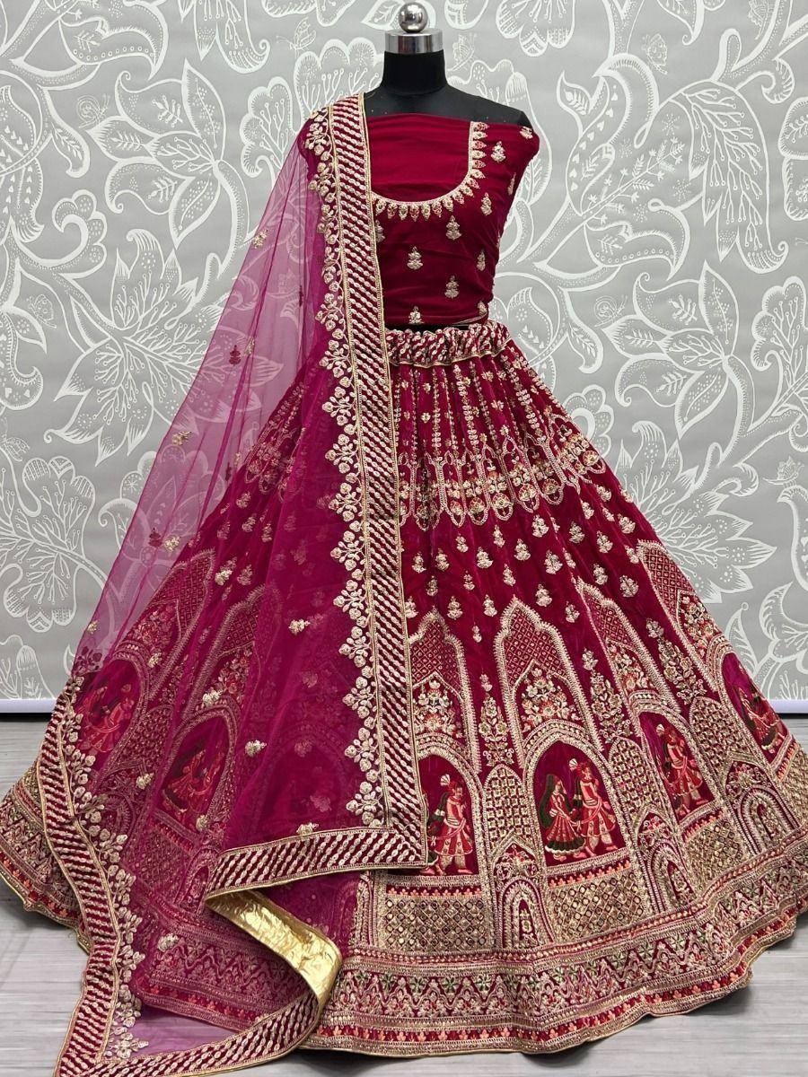 Maroon velvet lehenga choli with gold embroidery and sheer dupatta, Indian ethnic wear for weddings