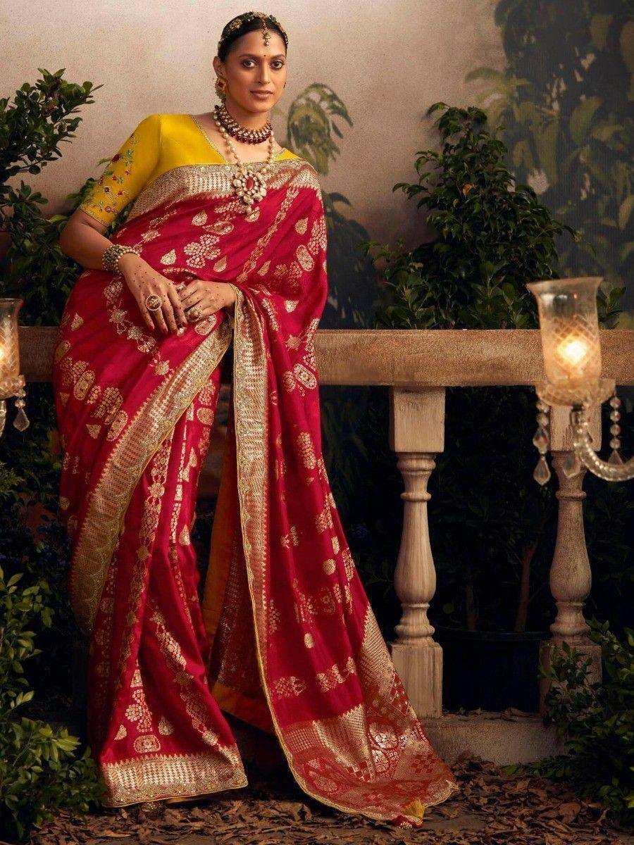 Red and gold embroidered saree with yellow blouse, traditional Indian ethnic wear for weddings and festivals