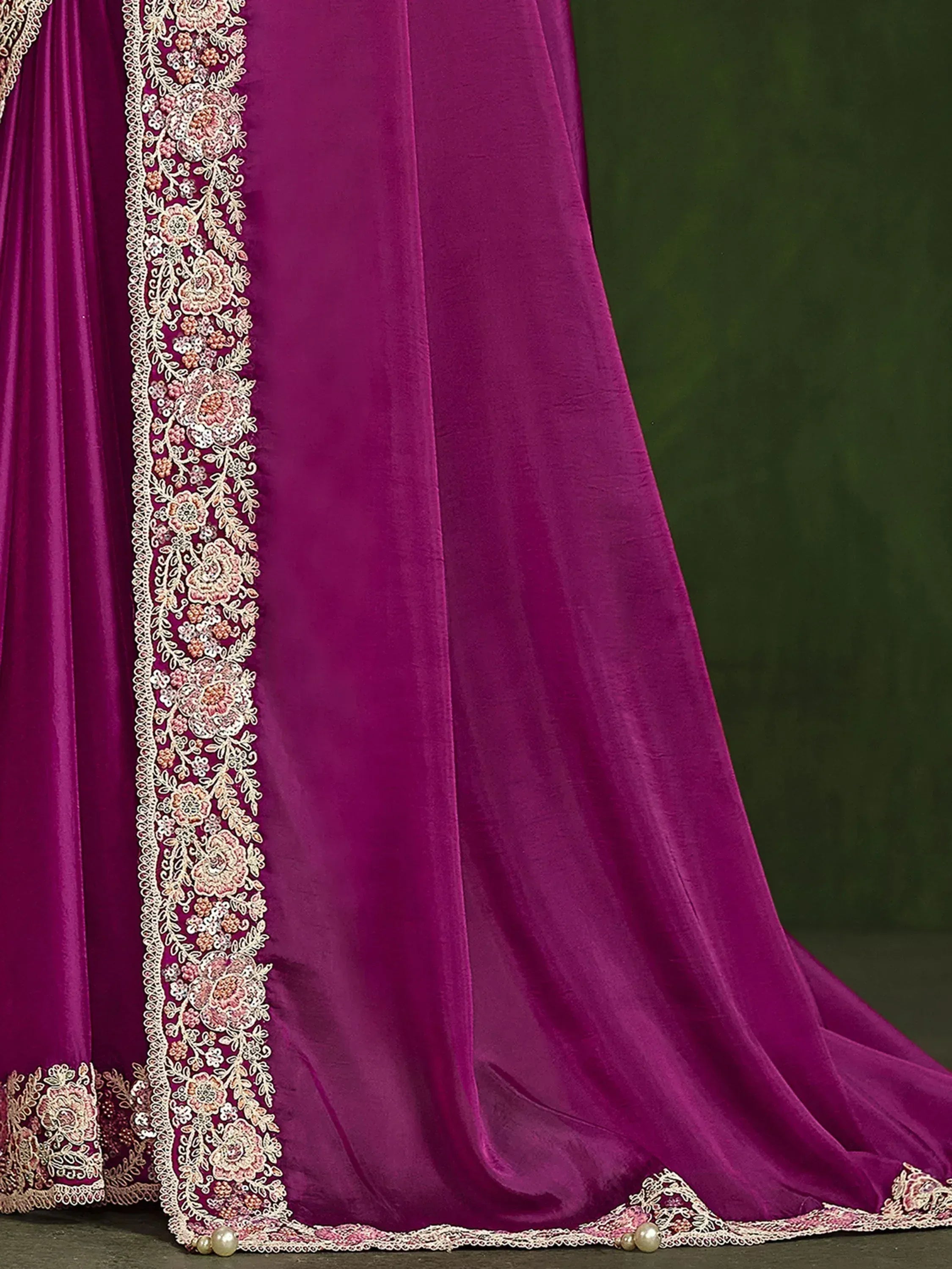 Purple velvet ethnic gown with floral embroidery and pearl detailing, perfect for Indian weddings and parties