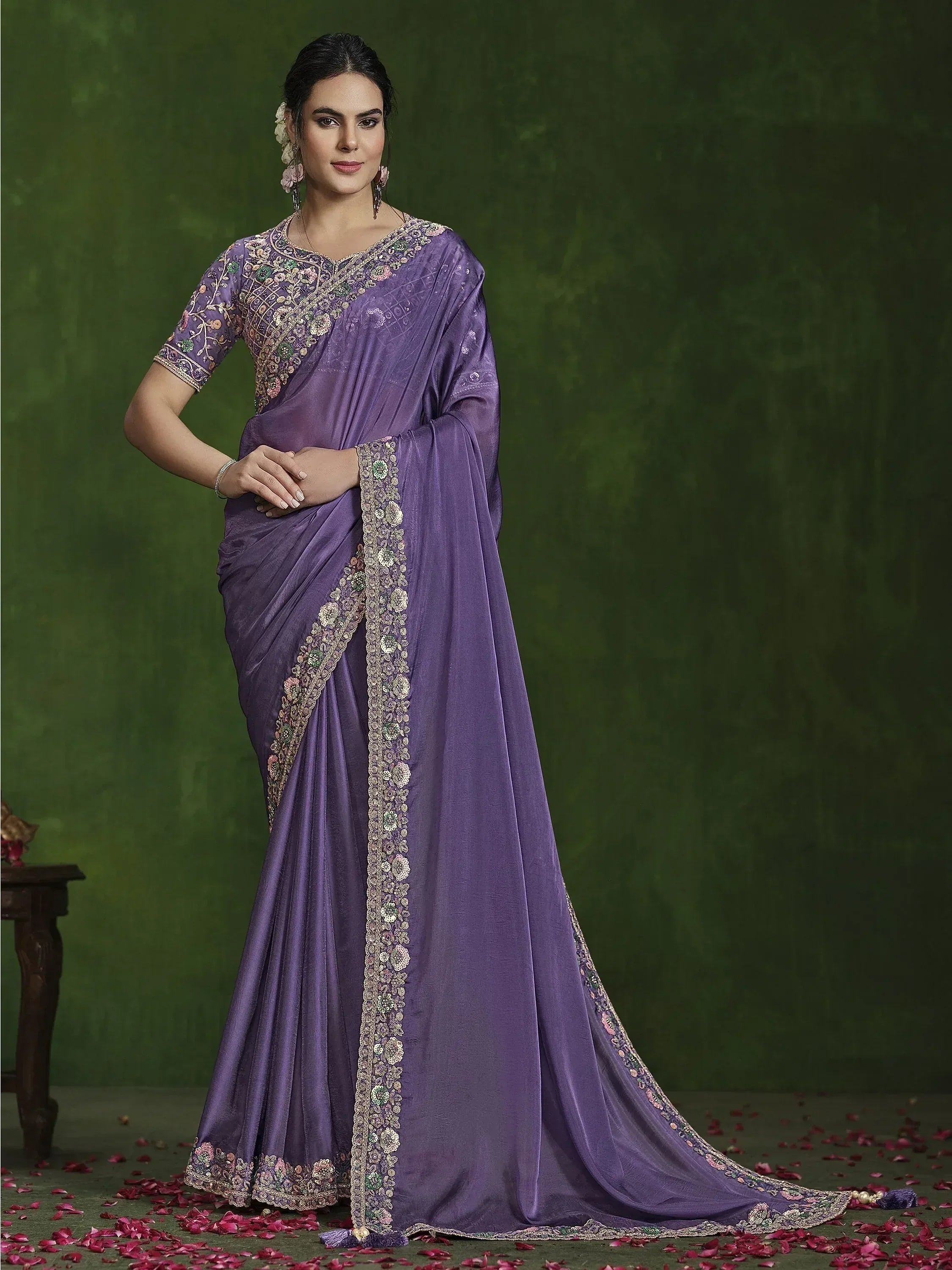 Purple embroidered saree with floral detailing, perfect for Indian ethnic occasions and festive wear.