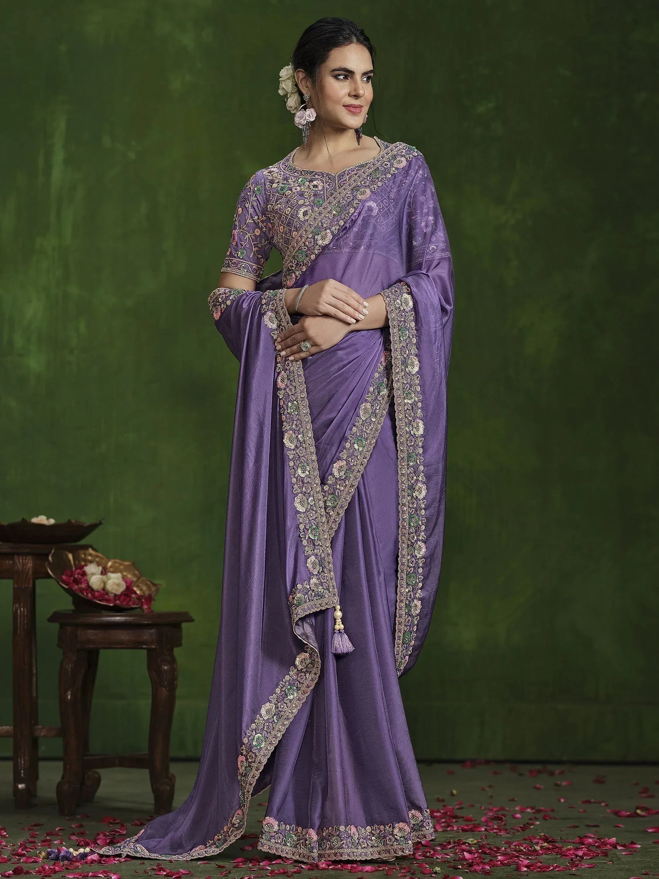 Purple embroidered saree with floral detailing, perfect for Indian ethnic wear occasions