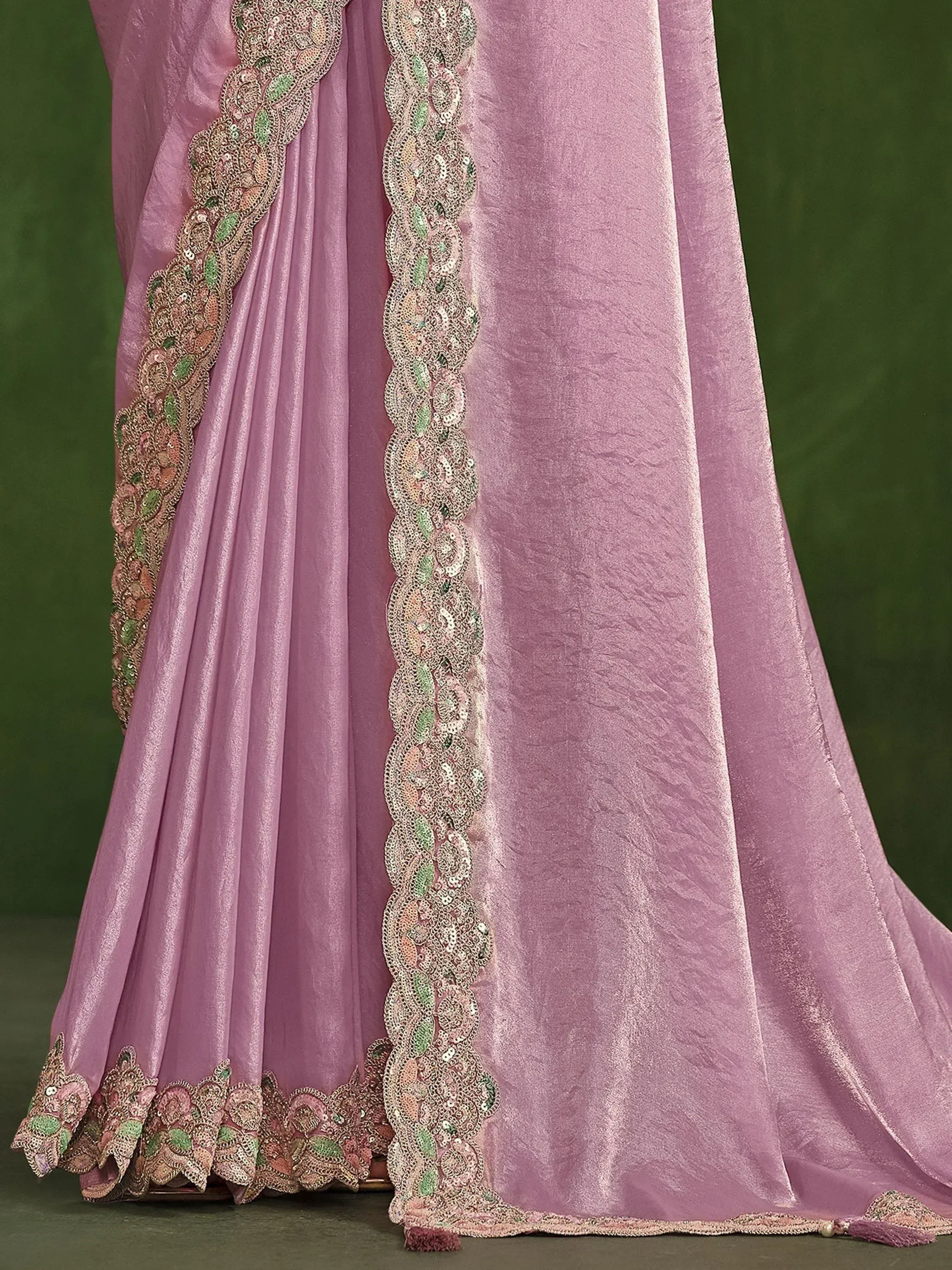 Pink designer saree with intricate floral embroidery and sequin border, perfect for ethnic occasions