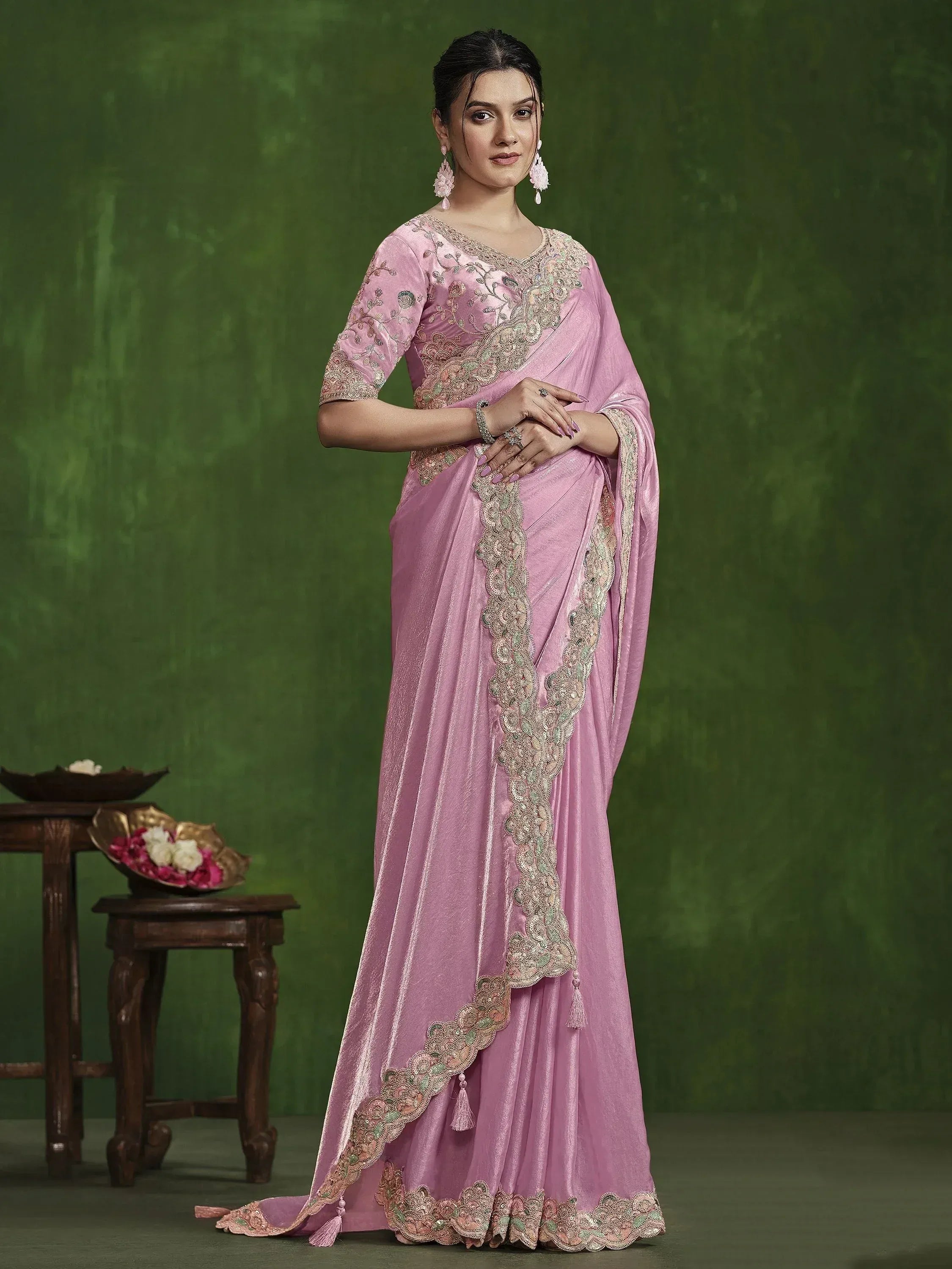 Pink embroidered saree with gold lace detailing, perfect for Indian ethnic wear occasions