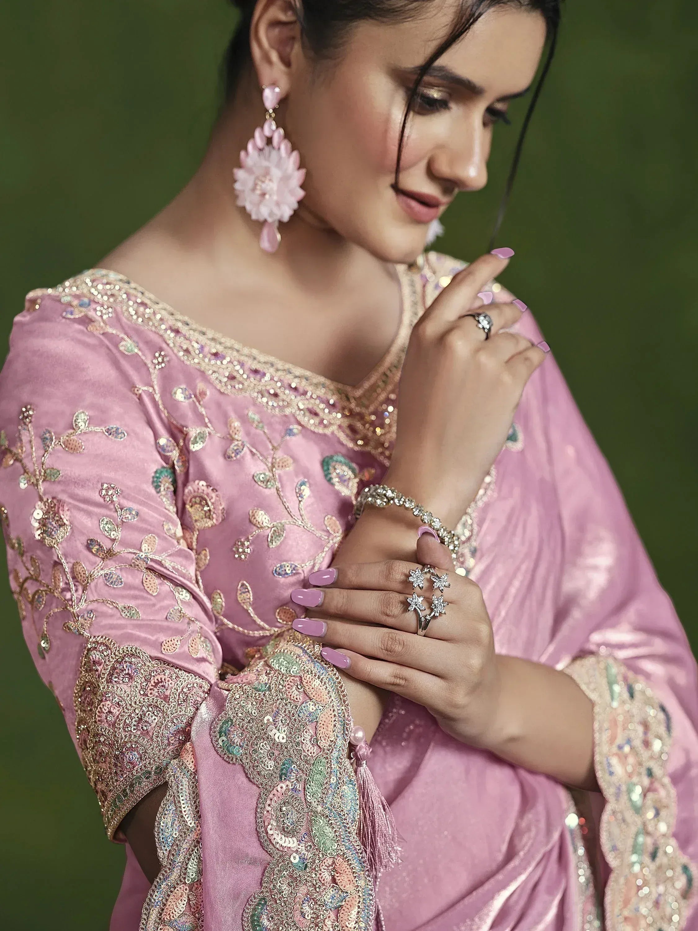 Pink embroidered ethnic gown with floral sequin details, perfect for festive occasions and weddings.