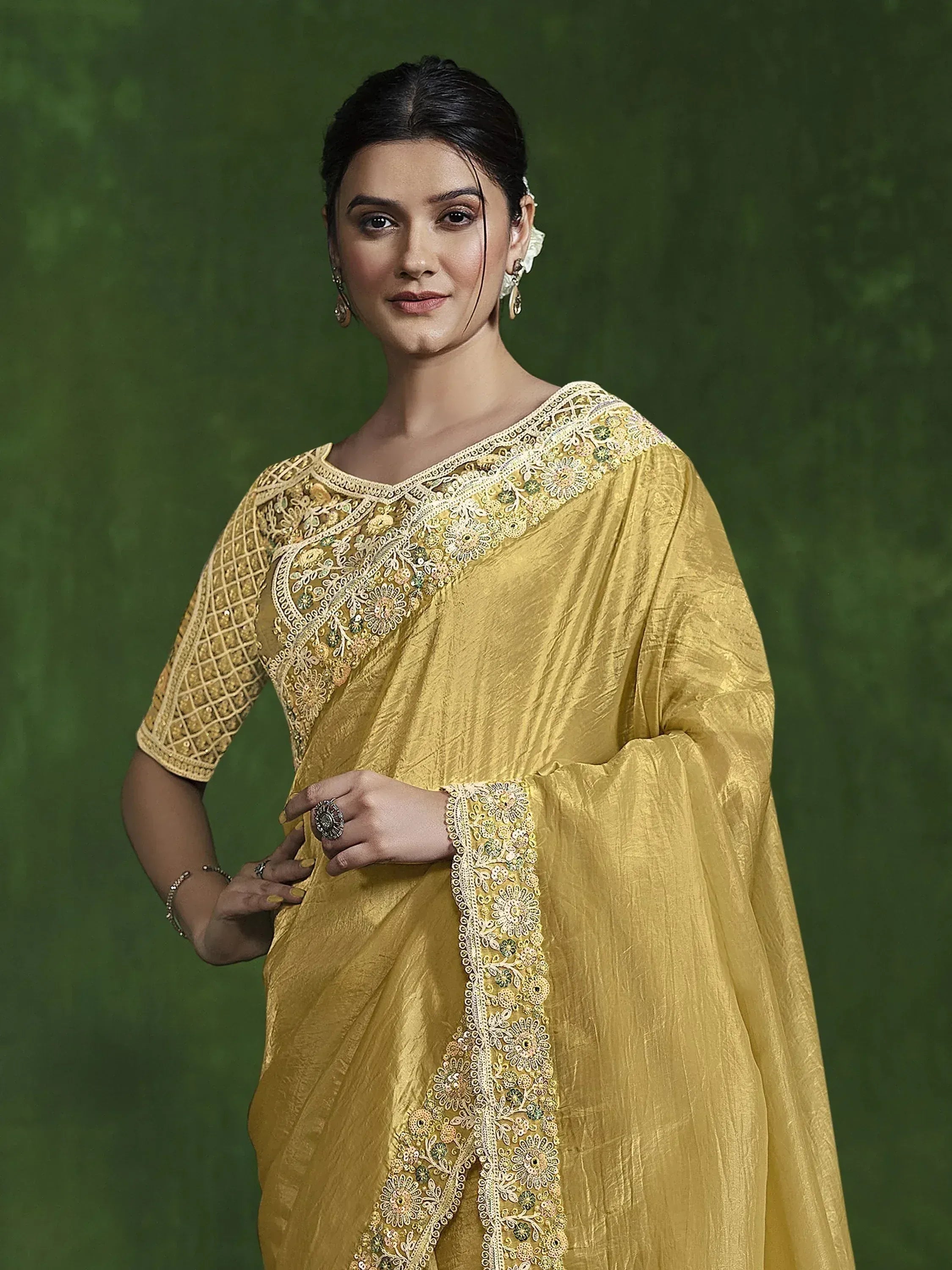 Yellow embroidered saree with floral detailing, perfect for Indian ethnic wear occasions