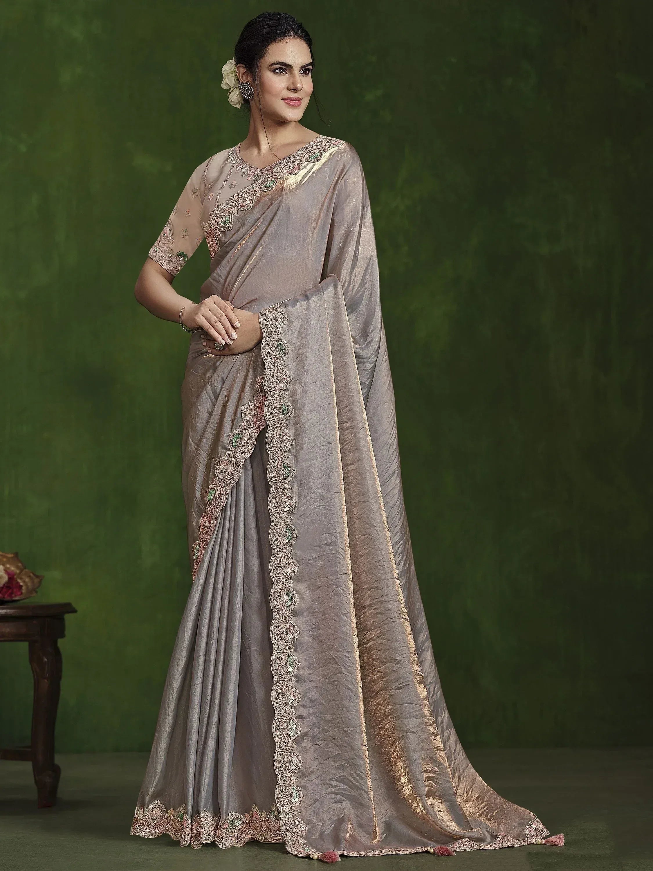 Elegant grey saree with intricate embroidery and sequin work, perfect for Indian ethnic occasions