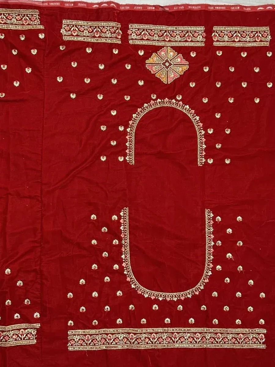 Red embroidered ethnic kameez fabric with floral motifs and border detailing for salwar kameez