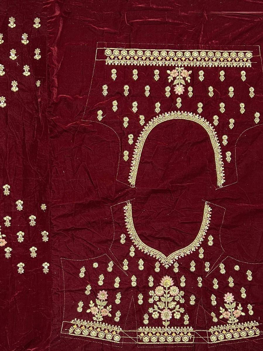 Maroon velvet lehenga choli with gold floral embroidery and mirror work, ideal for Indian ethnic wear
