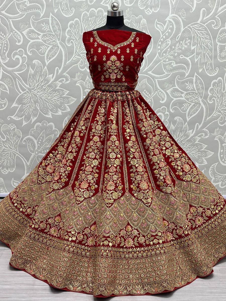 Red velvet lehenga choli with gold embroidery, designer ethnic wear for weddings