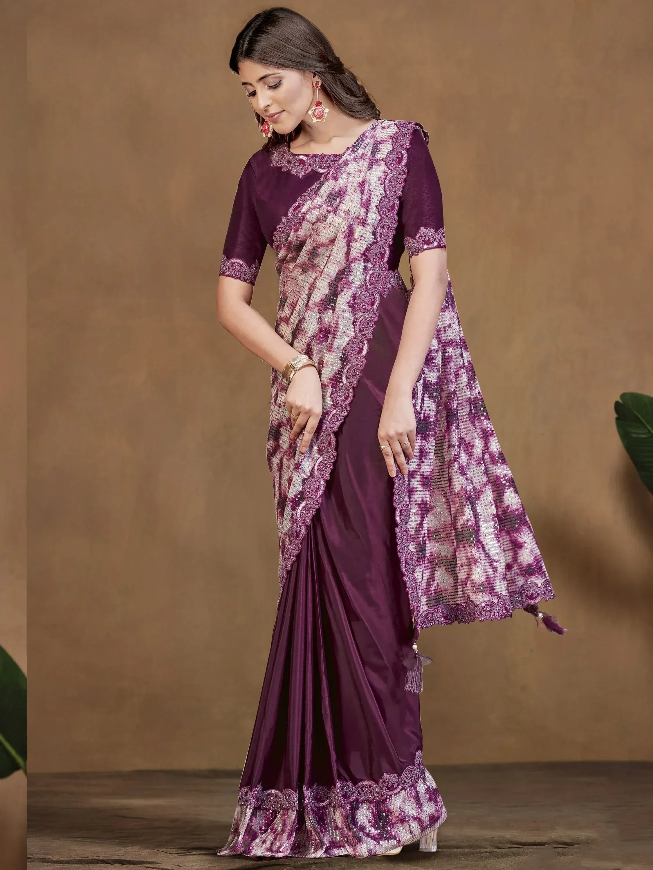 Elegant purple designer saree with sequin work and lace border, perfect for Indian ethnic occasions