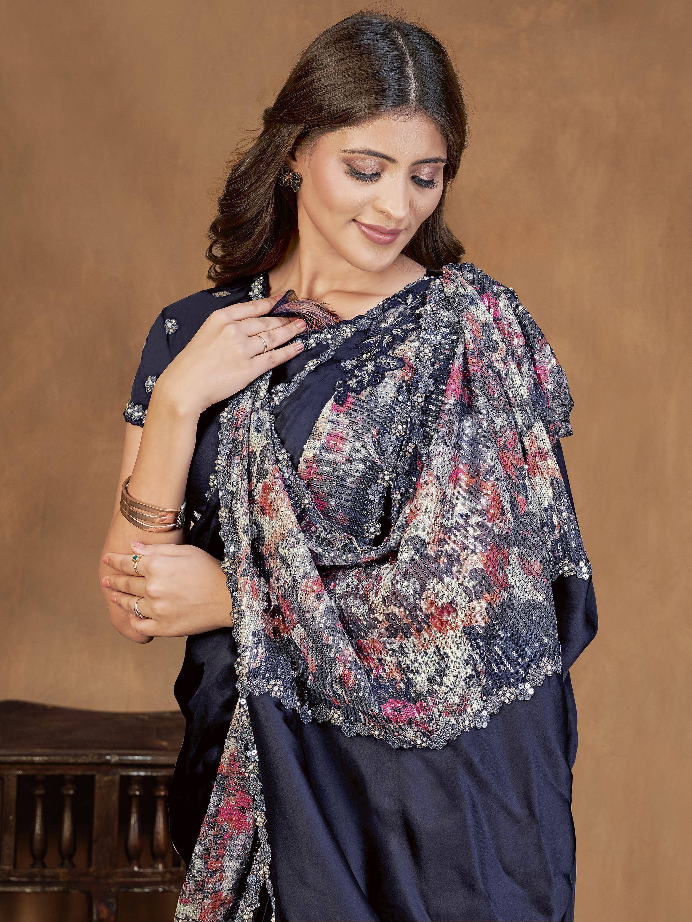 Woman in navy blue ethnic saree with sequin floral dupatta, perfect for Indian occasions