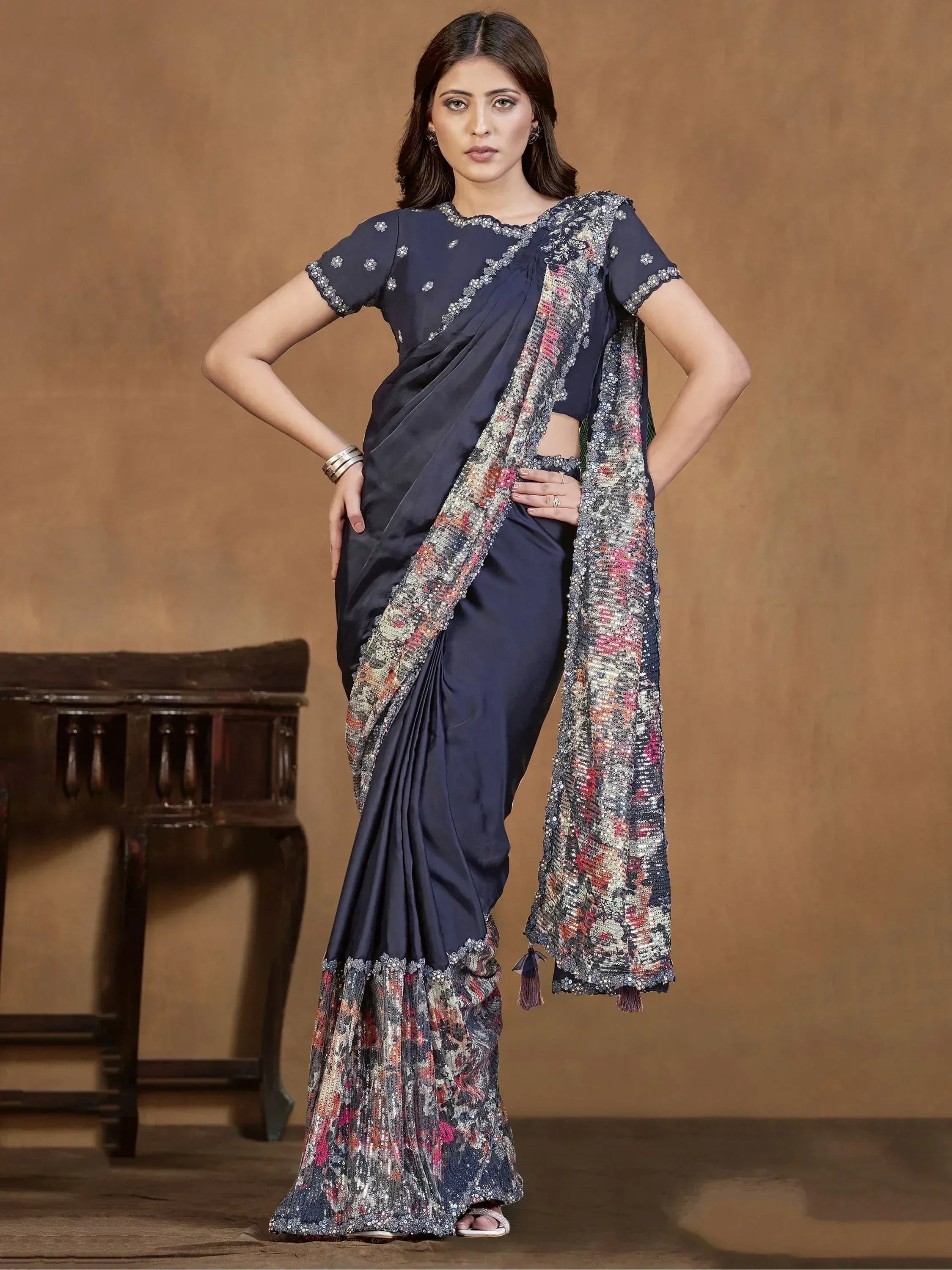 Navy blue designer saree with floral sequin border and matching blouse, elegant ethnic wear for women