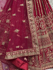 Ravishing Rani Pink Embroidered Velvet Bridal Wear Lehenga Choli