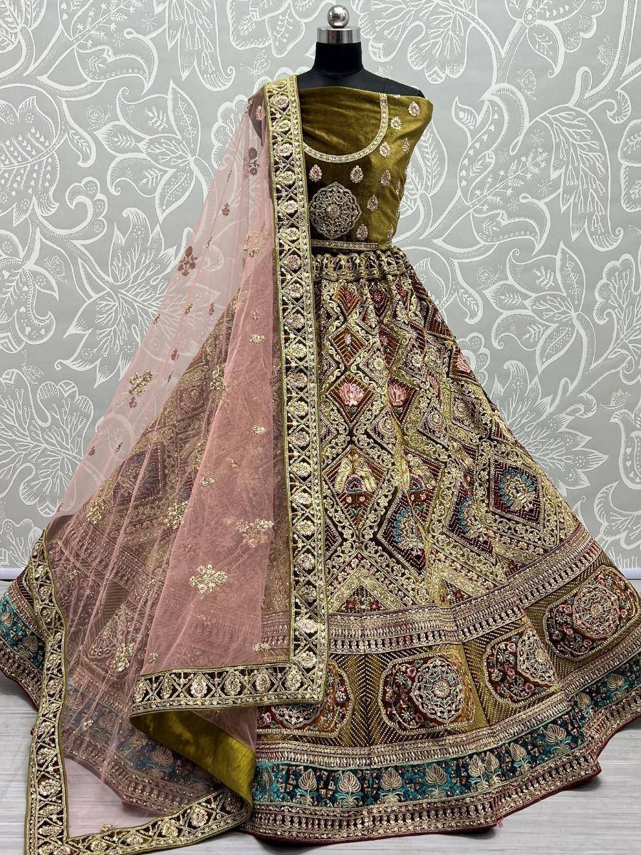 Designer lehenga choli with heavy embroidery, velvet blouse, and sheer dupatta for Indian ethnic wear