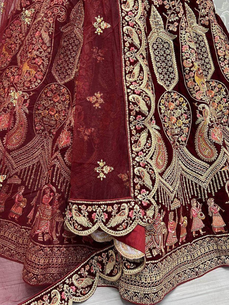 Tremendous Maroon Zari Embroidered Velvet Bridal Lehenga Choli