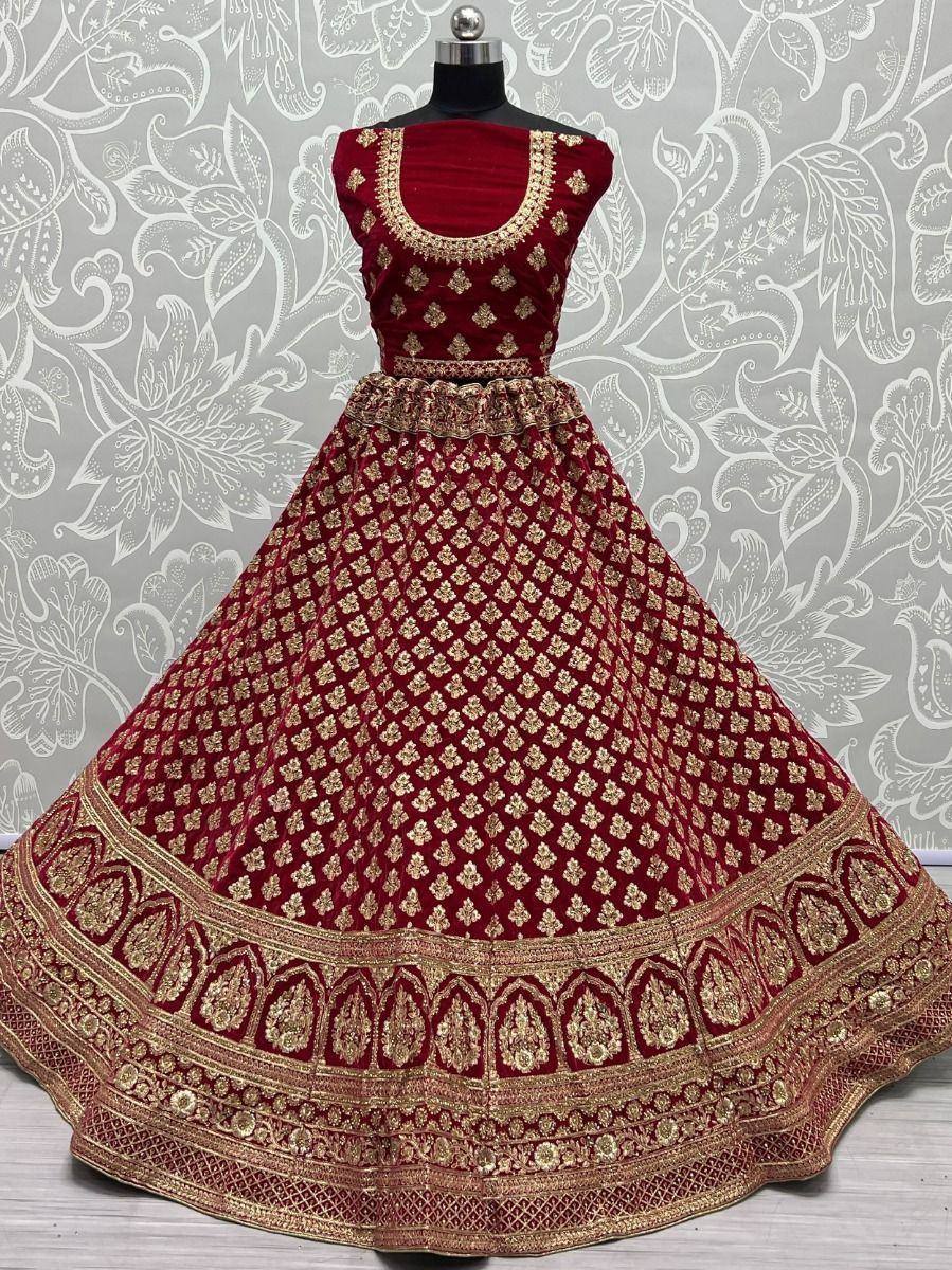 Maroon velvet lehenga choli with gold embroidery, perfect for Indian weddings and festive occasions