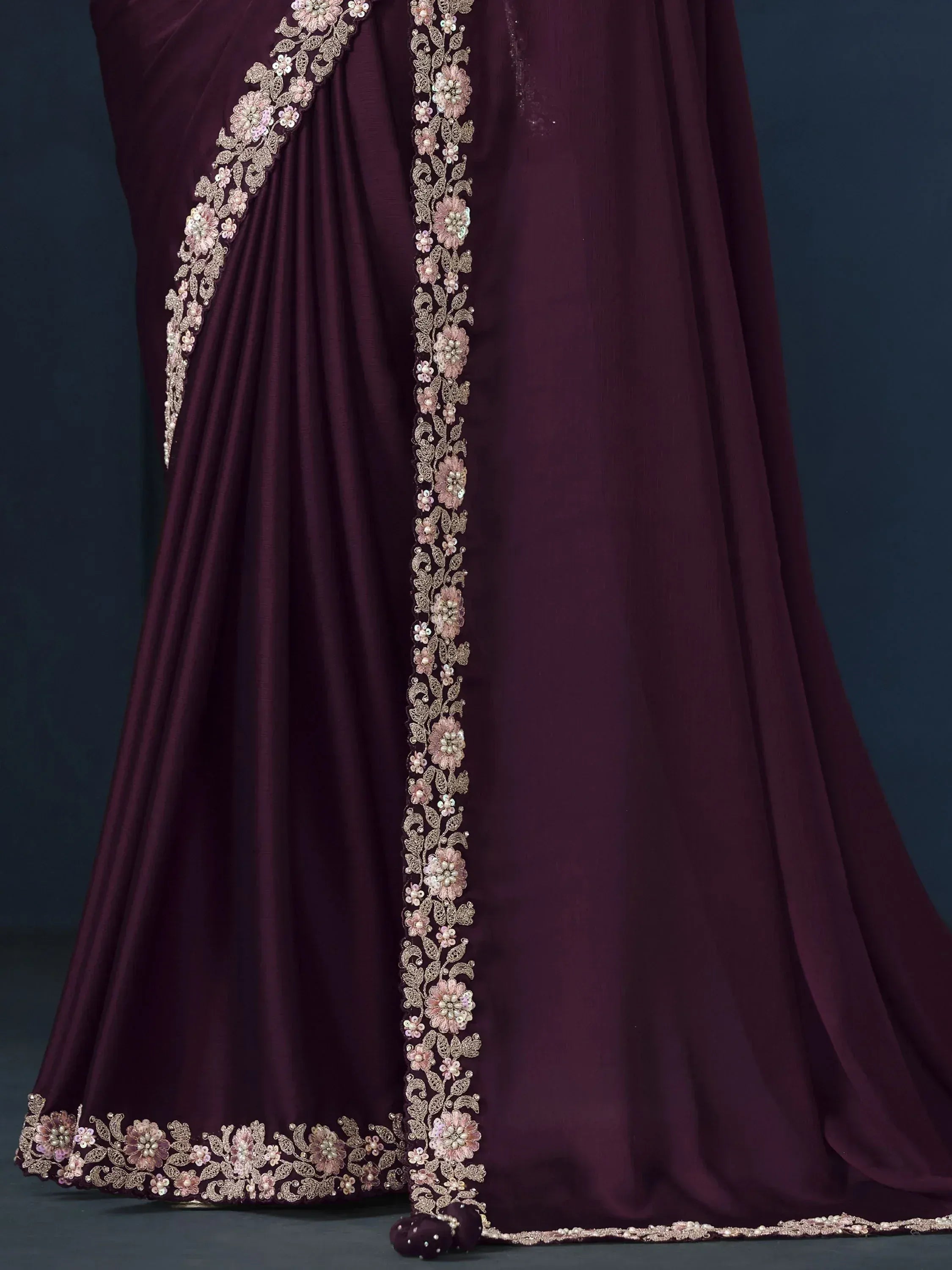 Elegant maroon saree with floral embroidery and sequin detailing, perfect for Indian ethnic occasions