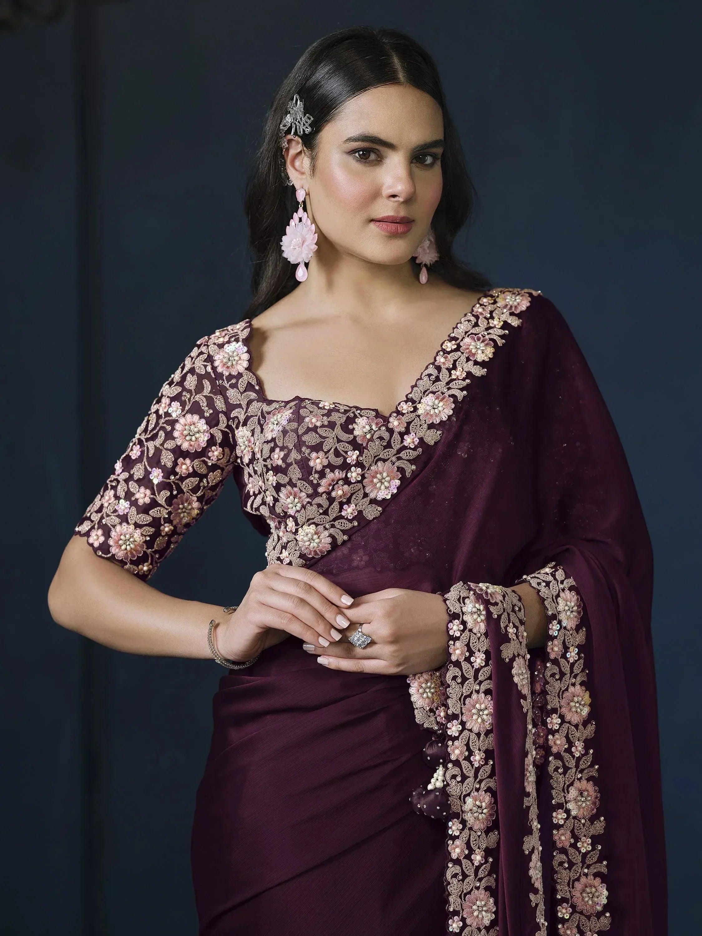 Elegant maroon saree with floral embroidery, perfect for Indian ethnic wear occasions