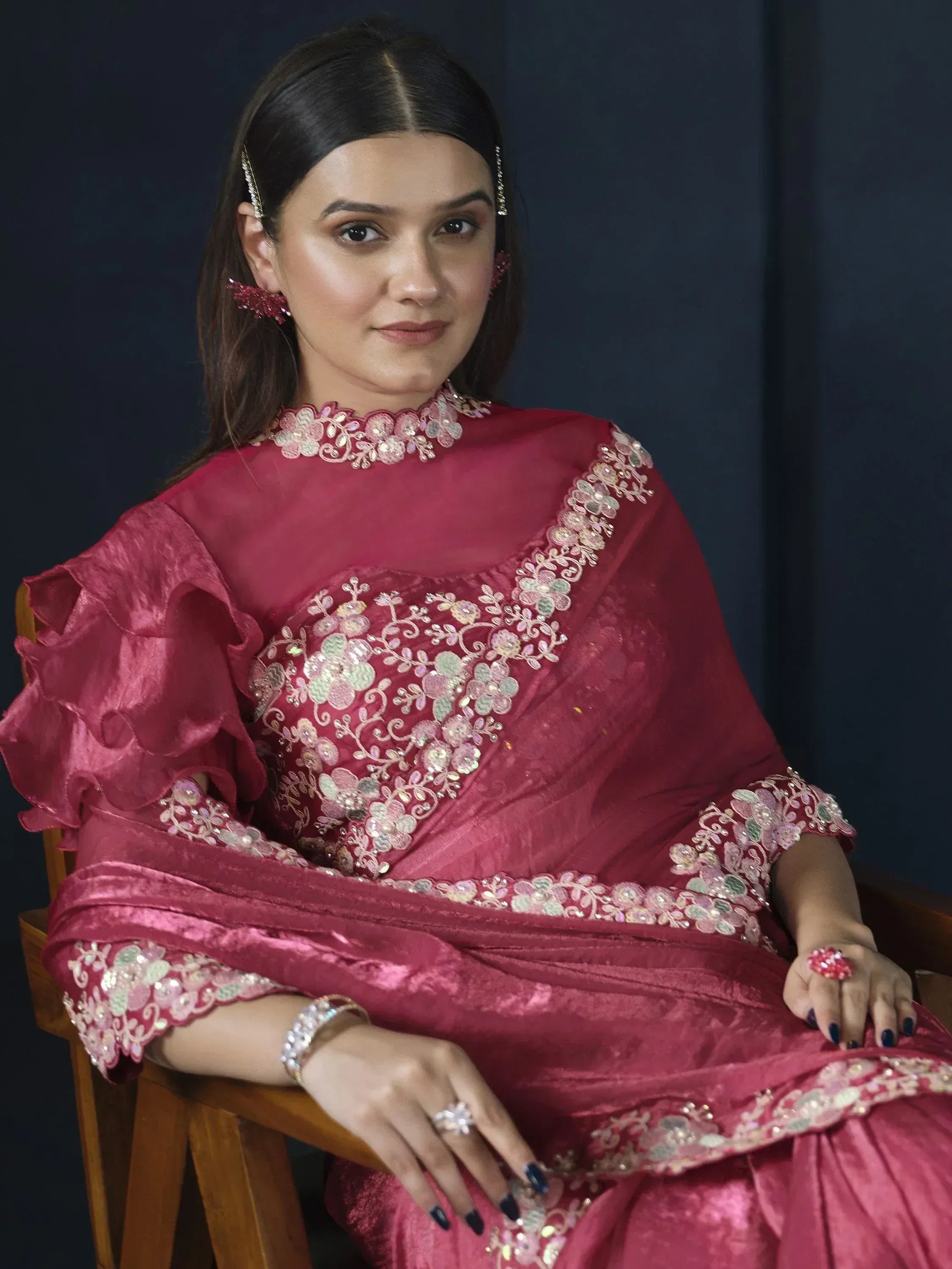 Elegant maroon ethnic gown with floral embroidery, perfect for Indian occasions and festive wear.