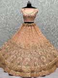 Glamorous Peach Sequined Embroiderey Net Reception Wear Lehenga Choli