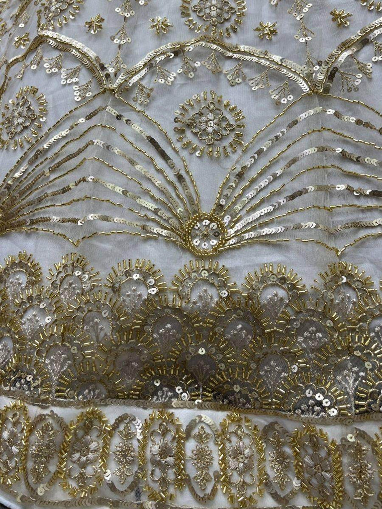 Splendid Ivory Cut-dana Embroiderey Net Reception Wear Lehenga Choli