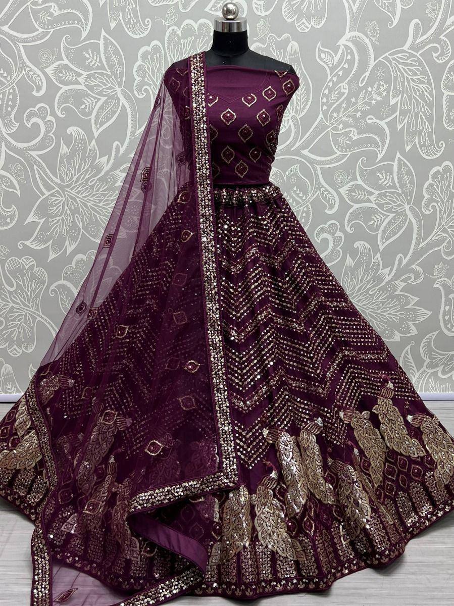 Elegant purple lehenga choli with gold embroidery and sequin work, perfect for Indian ethnic occasions