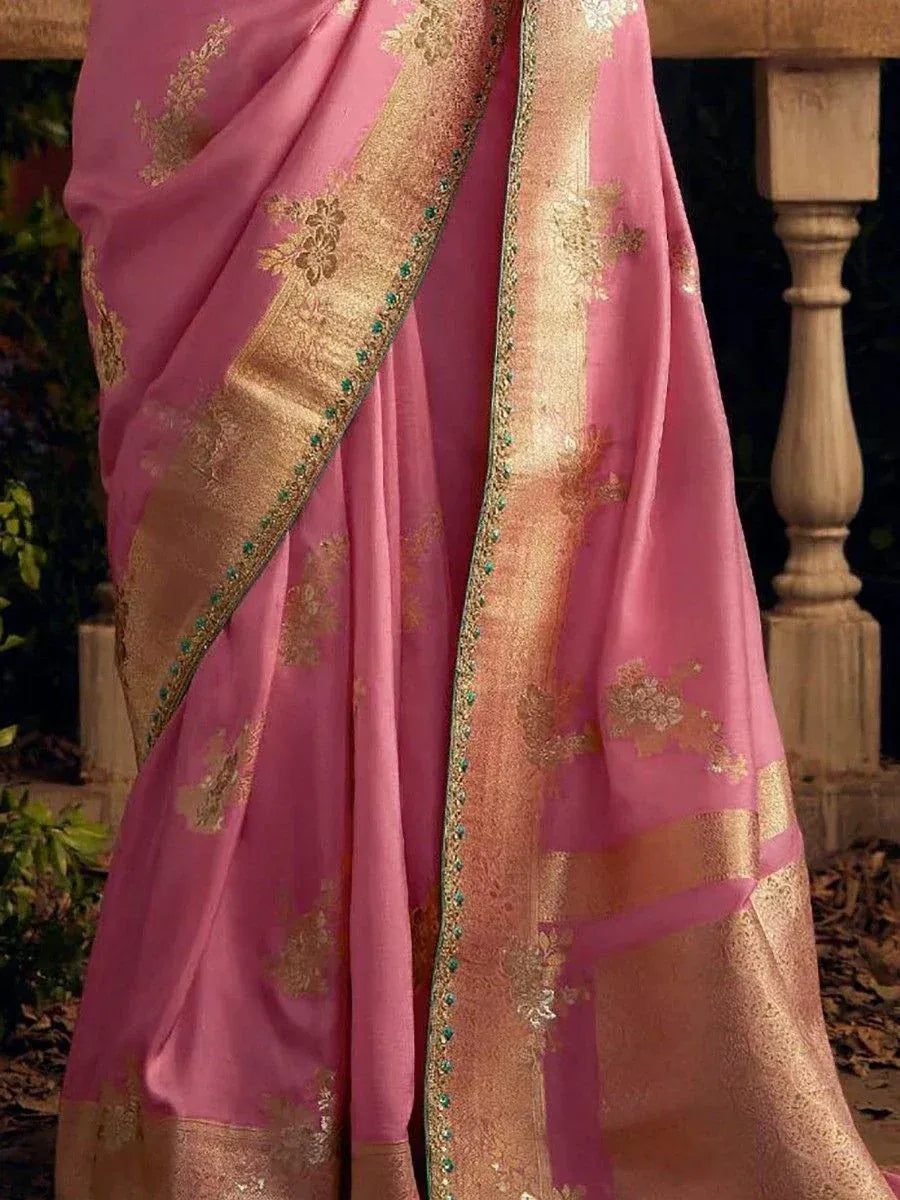 Pink designer saree with gold embroidery and green stone border, elegant ethnic wear