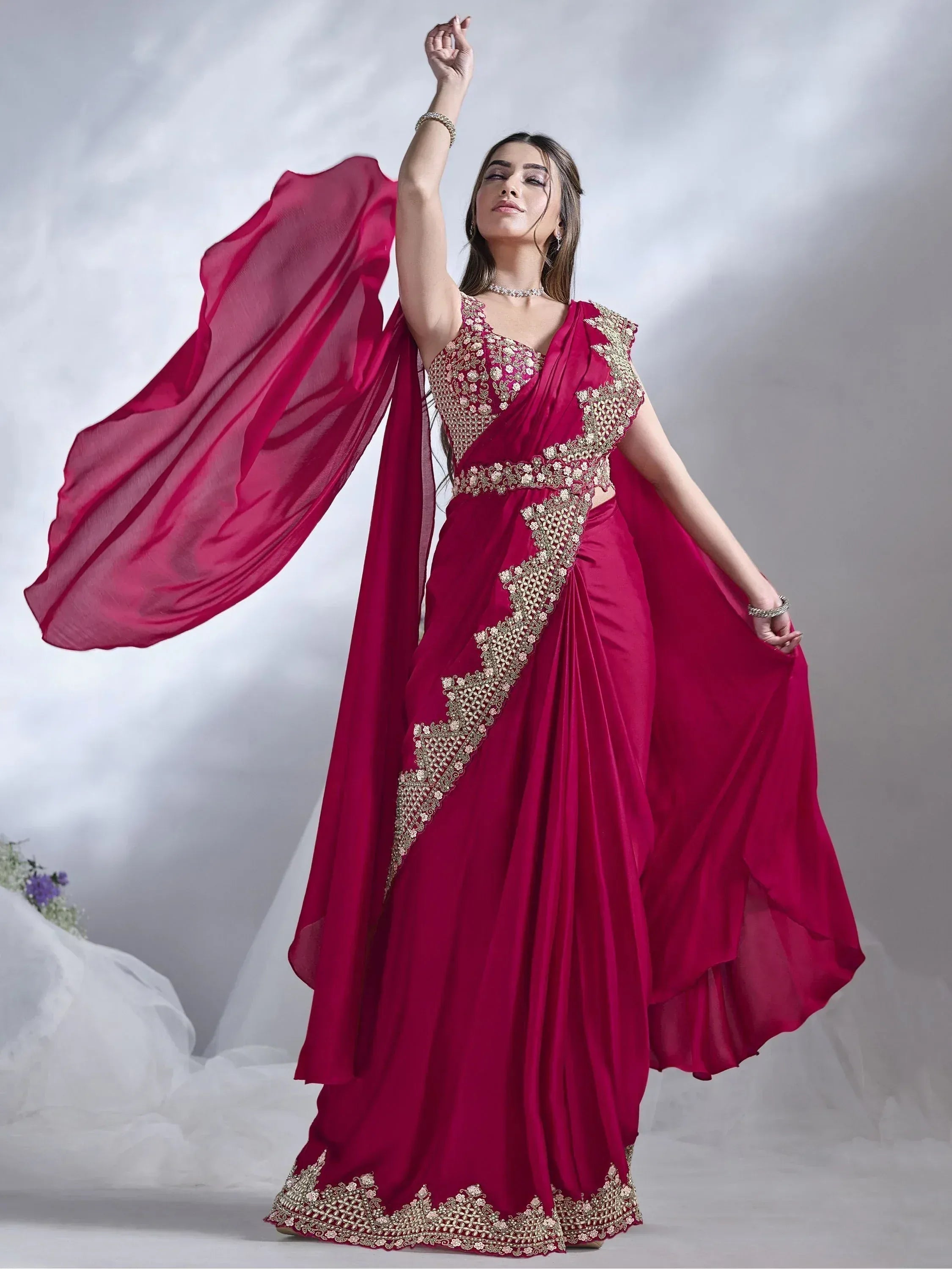 Elegant maroon saree with gold embroidery, perfect for Indian ethnic wear and festive occasions.