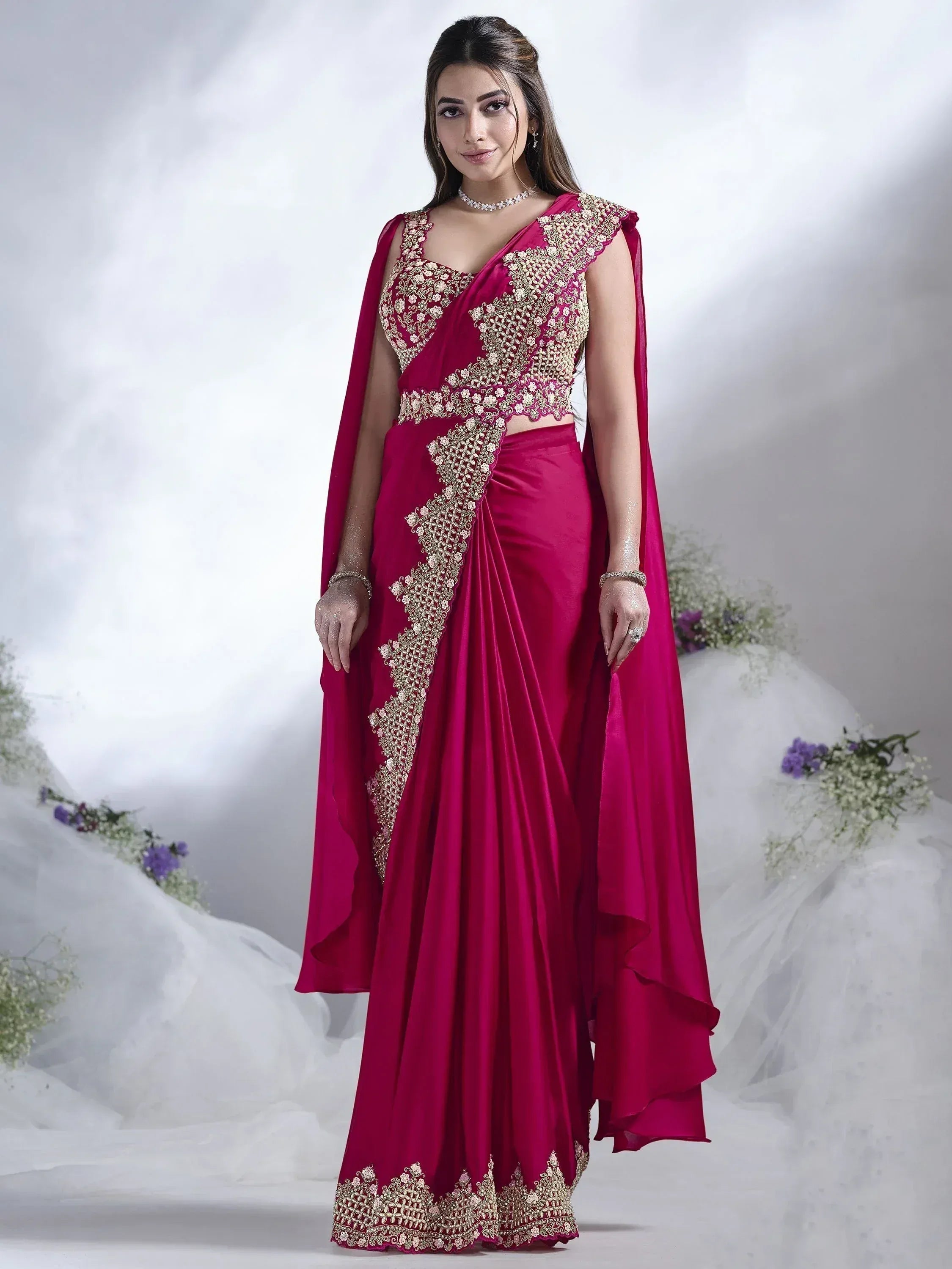 Fuchsia designer lehenga choli with gold embroidery, perfect for Indian weddings and festive occasions