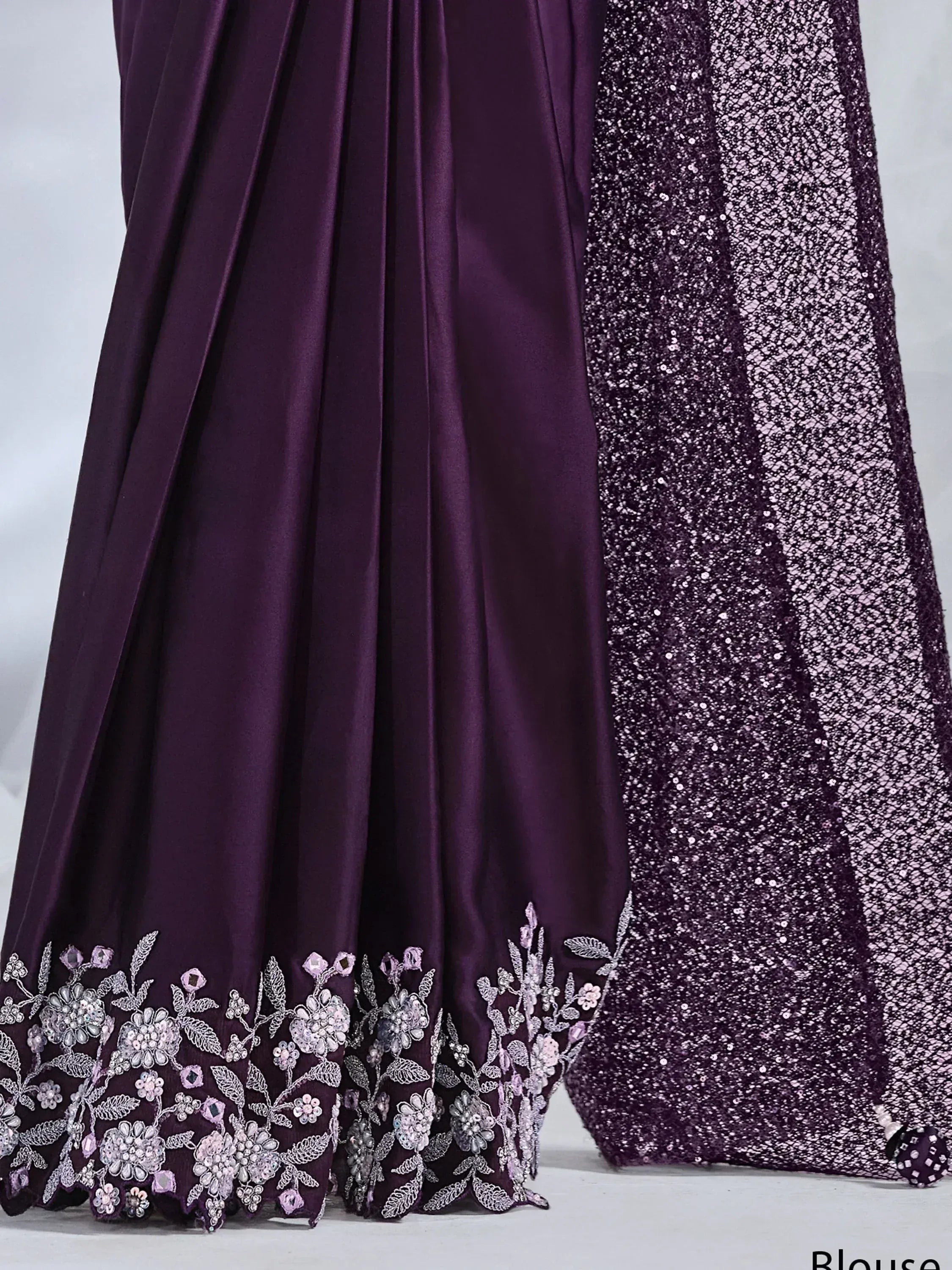 Purple ethnic gown with floral embroidery and sequin dupatta, perfect for Indian weddings or parties