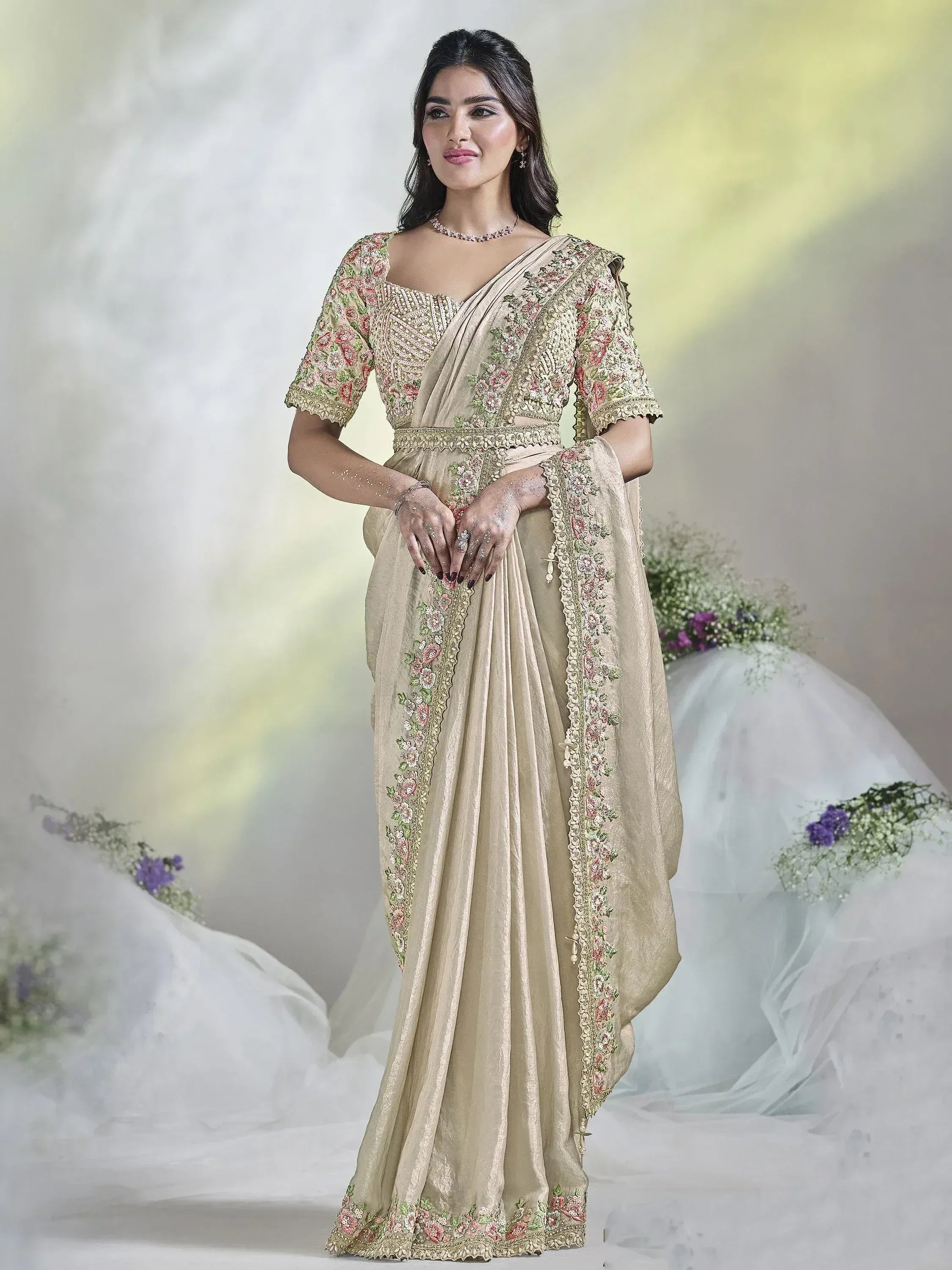 Beige floral embroidered lehenga choli with designer blouse and dupatta, perfect for Indian ethnic wear occasions.