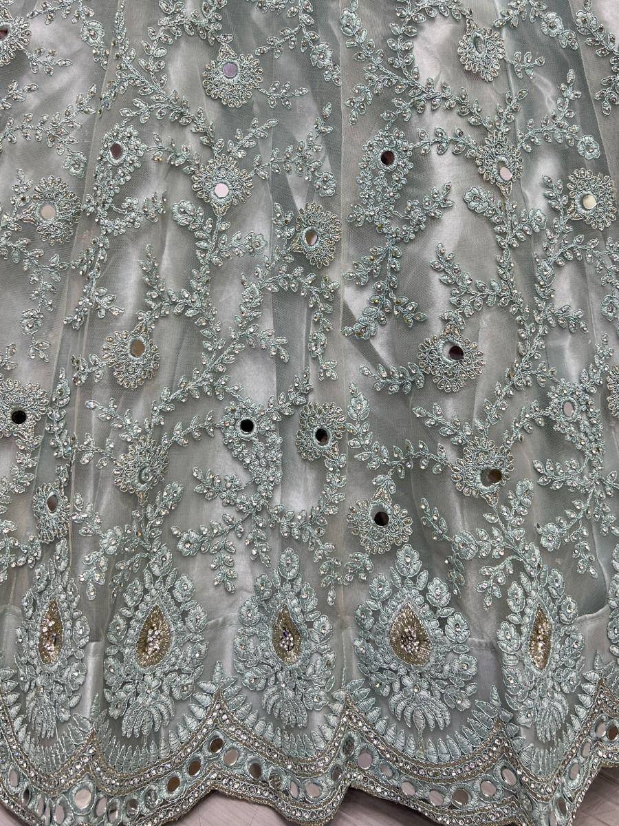 Light blue embroidered lehenga with floral zari work and mirror detailing, perfect for Indian ethnic wear