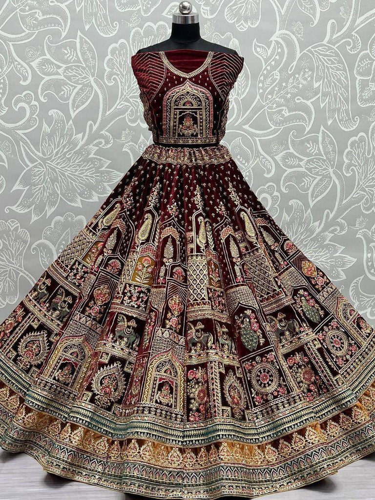 Scrumptious Maroon Zari Embroidery Velvet Bridal Lehenga Choli