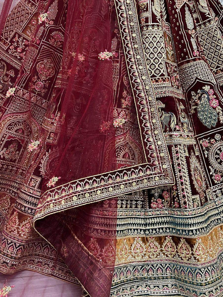 Scrumptious Maroon Zari Embroidery Velvet Bridal Lehenga Choli