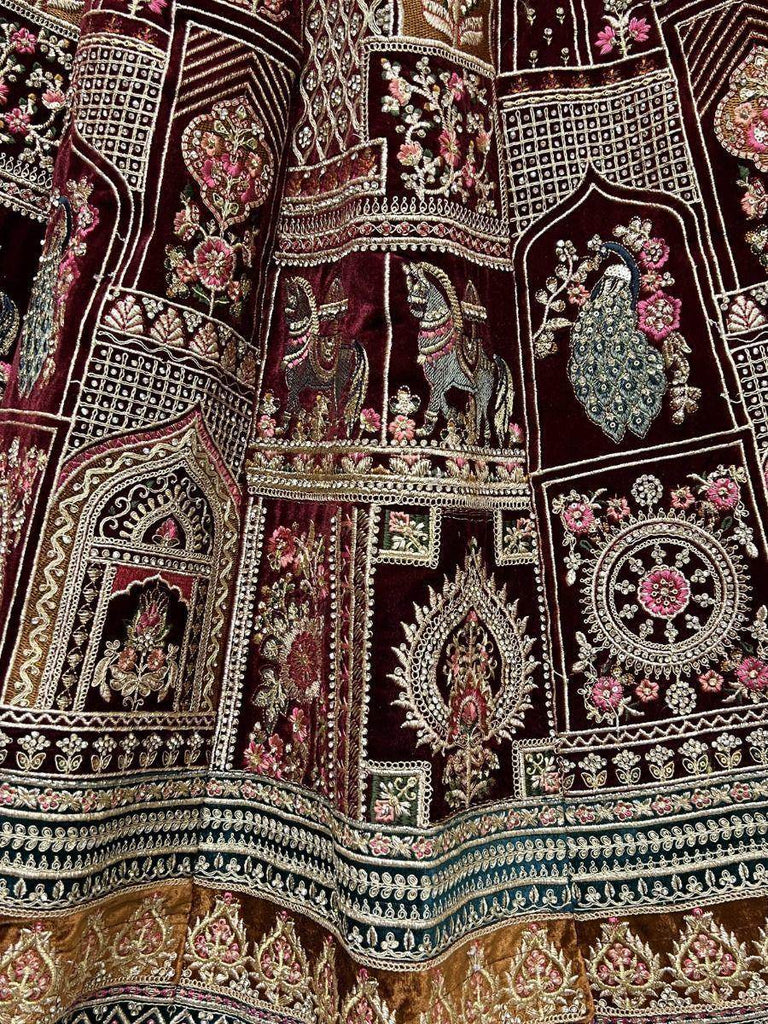 Scrumptious Maroon Zari Embroidery Velvet Bridal Lehenga Choli