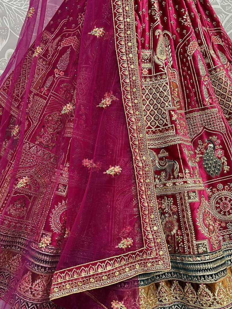 Wonderful Rani Pink Zari Embroidery Velvet Bridal Lehenga Choli