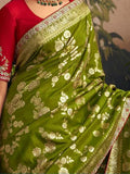 Glamorous Green Zari Woven Dola Silk Wedding Wear Saree With Blouse